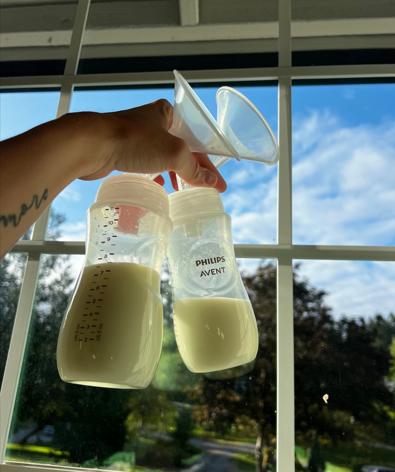Did you know the Phillips avent bottles will connect to your spectra pump parts?! This is the perfect setup if you want to pump right into a bottle or if you need bigger cups to pump into!! Such a lifesaver. I prefer to use the glass bottles, but the plastic ones are slightly lighter to pump with. #breastfeedingmom #ftm #pumpingmom 