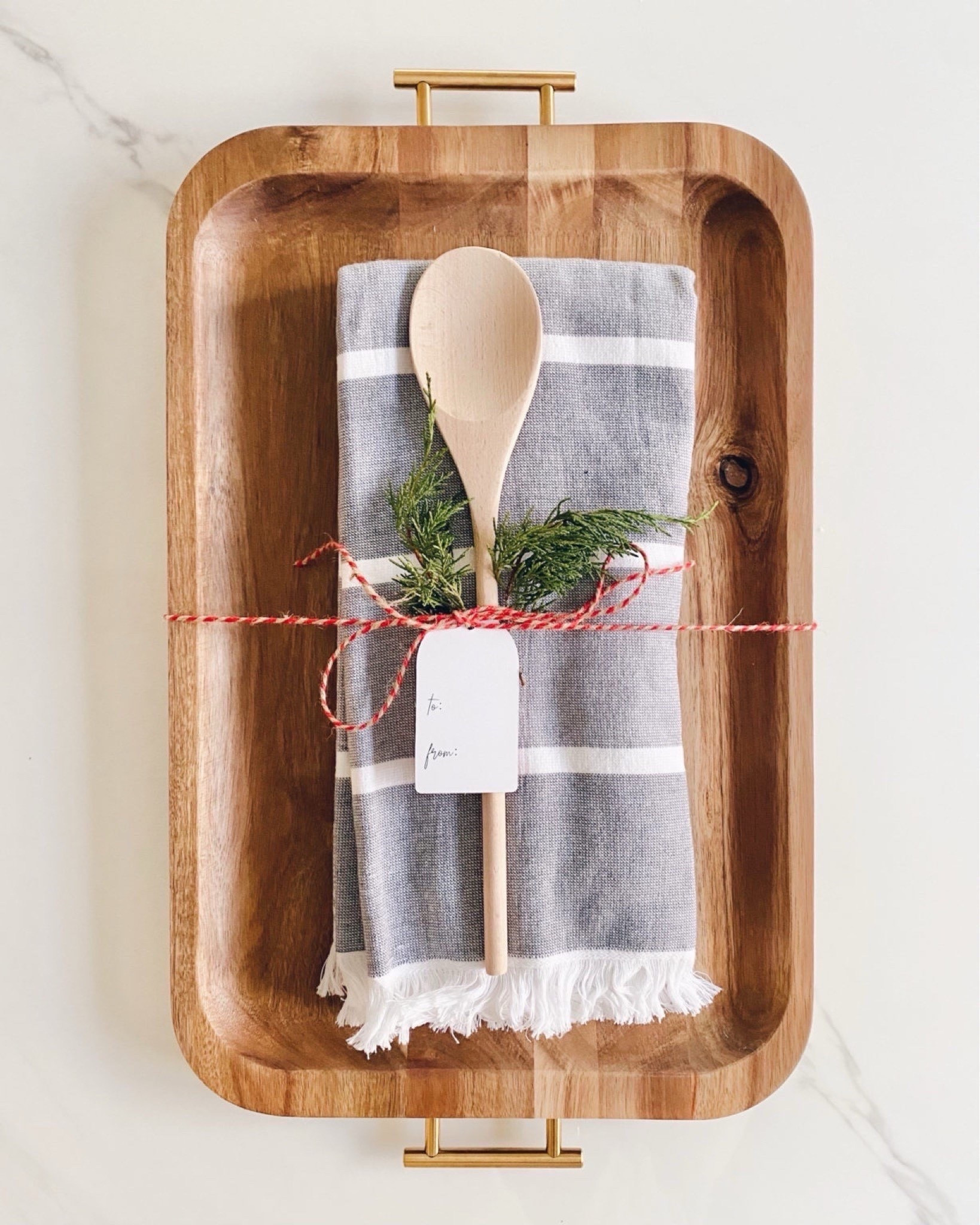 This hostess gift I have done for YEARS! The board is stocked but linking similar towel and spoon options 

#LTKHoliday #LTKGiftGuide