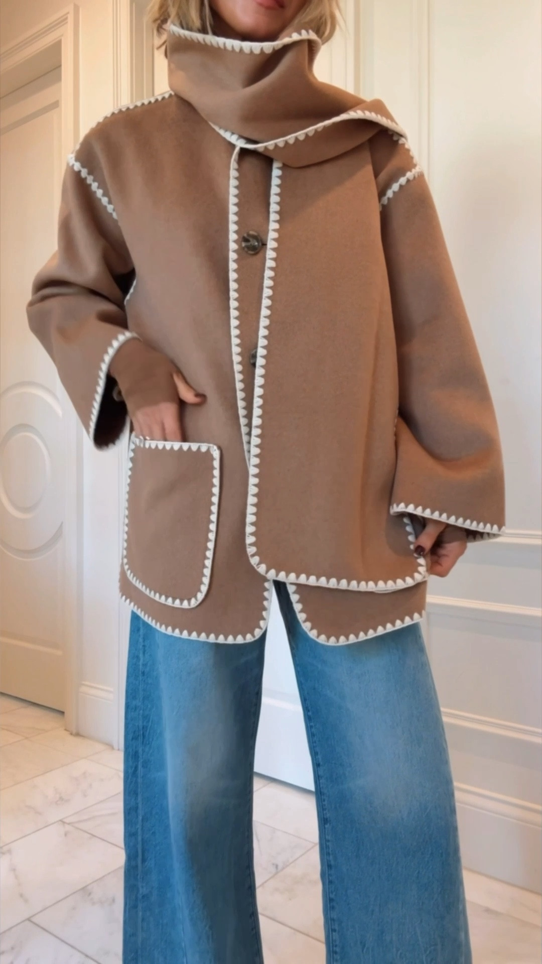 This scarf coat looks designer but for $200. Very impressed w the quality. Im wearing size small fits tts 