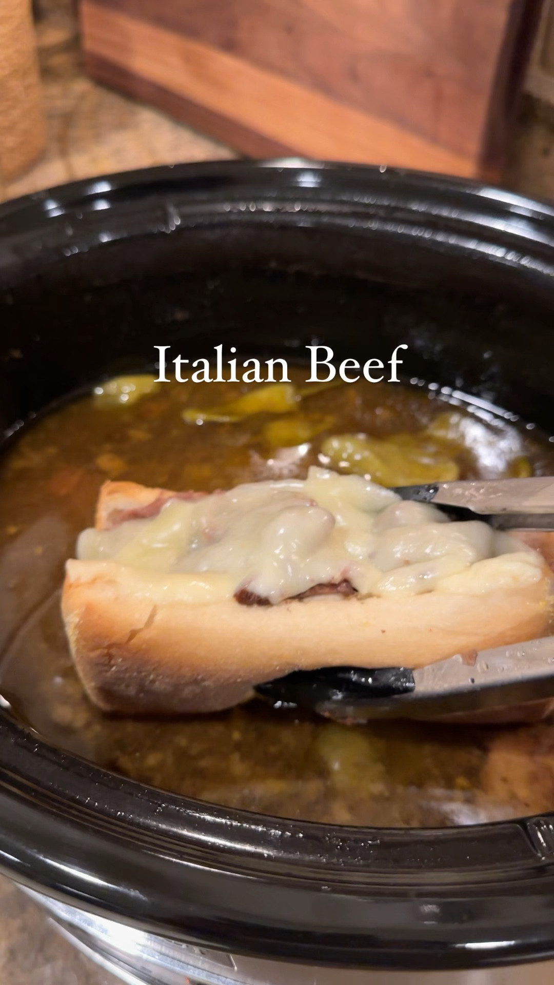 
Crockpot Italian Beef

Here’s what you’ll need:
2-4lb Chuck roast
Olive oil
1 packet of Good Seasoning Italian Dressing Mix
2 cartons of beef broth
1 jar pepperoncini
3 tbs mild giardiniera
Salt, Pepper, and garlic powder (to coat)

Sub rolls
Freshly sliced mozzarella cheese
Sautéed green peppers (optional)
Tater tots as a side

Here’s how you make it:
1. Remove meat from fridge 30 mins prior to starting  Rub olive oil onto the chuck roast and season generously on all sides with the good seasoning packet, salt, pepper, and garlic powder.
2. Heat a skillet on the stove and sear each side of the chuck roast until it develops a crust.
3. Remove from the heat and place the chuck roast into a crockpot.
4. To the crockpot add the entire jar of pepperoncinis, giardiniera, and beef broth to just cover the roast.
5. Put the lid on, and let cook on low for 6-8 hours until meat is fork tender. I usually go to the 8 hour mark.
Once the meat shreds easily with a fork, remove to a bowl and shred with two forks. It's then ready for assembly.
Turn on the broiler:
6. Add the sub rolls to a baking pan, fill them with the beef. Top with a fresh slice of mozzarella cheese then broil in the oven to melt the cheese and toast the bread (1-2 minutes is all they need!)
Remove from oven. Dunk the beef sandwich in the cooking liquid and serve!  
Serve with additional gardinara, sautéed green peppers abe tater tots!  
