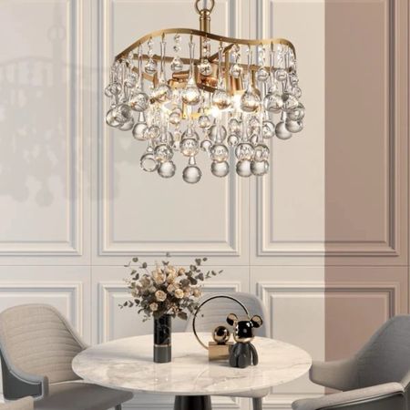 Shop elegant crystal chandeliers! The Khari 4 - Light Dimmable Tiered Chandelier is under $200.

Keywords: Crystal chandelier, chandelier, dining room, living room

#LTKHome #LTKSaleAlert #LTKSeasonal