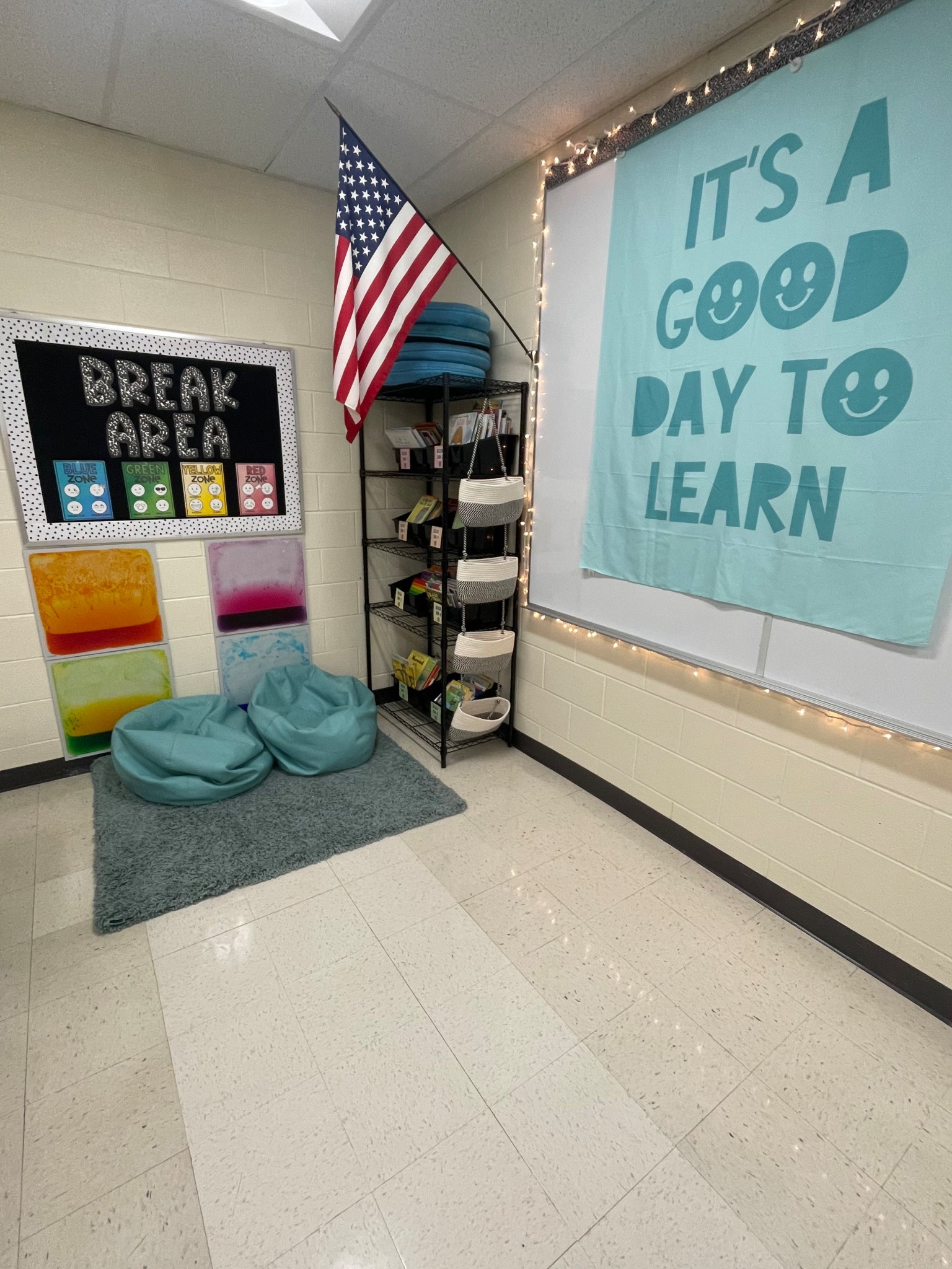 Here’s my little break area spit in my classroom. The tapestry is from Etsy! It’s a good day to learn! 