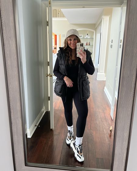 Spring outfit. Spring transition outfit. Workout jumpsuit. Amazon jumpsuit. Chunky sneakers. Steve Madden sneakers. Casual look. Puffer vest. Weekend style. 

#LTKFind #LTKstyletip