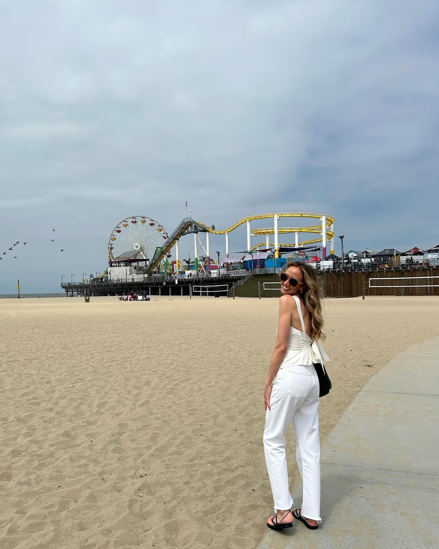 Tonal outfit, Agolde jeans, free people top, Ancient Greek sandals 

#LTKsummer #LTKstyletip #LTKeurope