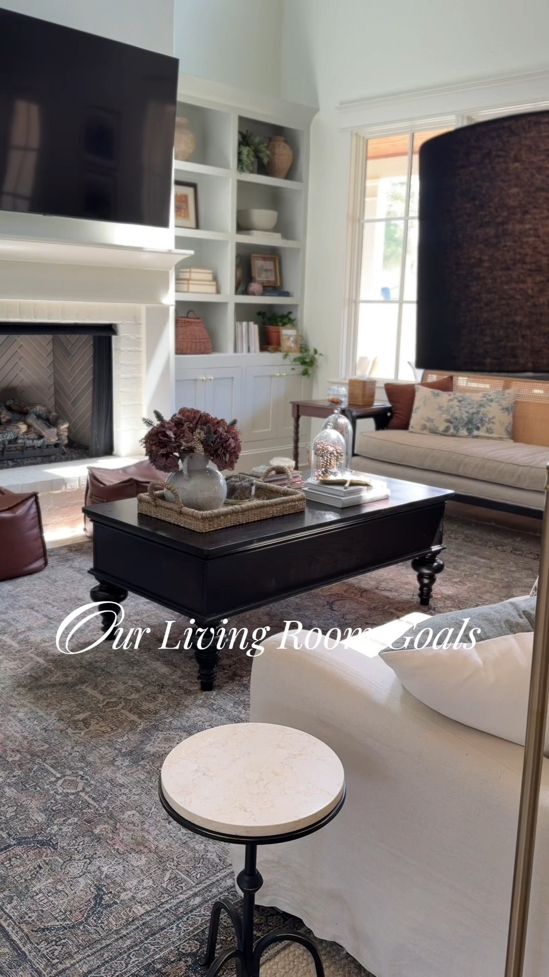 Welcome to our living room dressed for fall🤍 Three words I’ve used as a guiding direction for our living room as it’s evolved over the years: cozy, classic, and collected. I love the layers of rugs, blankets, pillows, and upholstery that bring the cozy factor, elements like brass, marble, and timeless silhouettes for that classic touch, and a mix of old and new for that collected look — like our 1920s cane sofa paired with Target accent chairs. Each piece helps tell the story of a home that feels layered, lived-in, and intentional.

Our Target accent chairs & coffee table have been discontinued, but I linked similar below  

#LTKSeasonal #LTKHome