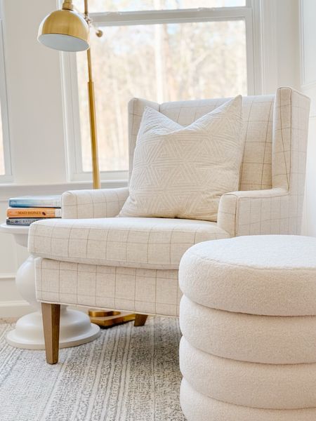 My current reading corner features this pretty windowpane chair, brass floor lamp and neutral area rug. I just added this Sherpa storage ottoman that stores all of my reading items and the top doubles as a foot stool. home decor living room decor bedroom decor home storage seating lighting Wayfair find accent table side table

#LTKsalealert #LTKhome #LTKstyletip