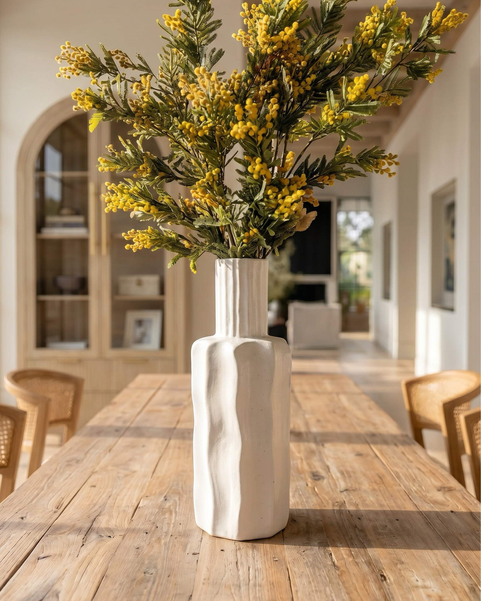 Oak wood extendable dining table
Wood cane dining chair
Beige jute rug
Wood oak console credenza 
White ceramic vase 
Distressed terracotta vase
Ceramic table lamp 
Brass gold decor figures 
Decor book 
Oak wood display cabinet 
Brass gold chandelier 
Glass brass wall sconce 
Blue subtract wall art 

#LTKSaleAlert #LTKHome