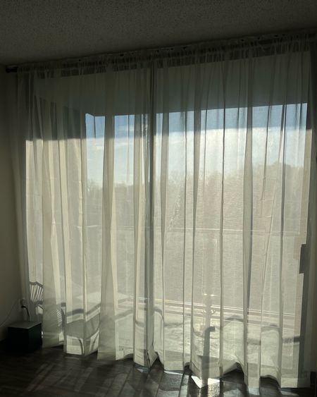 Replaced my apartment vertical blinds with sheer curtains and the morning light is perfect! No screw curtain rod brackets for easy removal 

#LTKhome #LTKfindsunder100