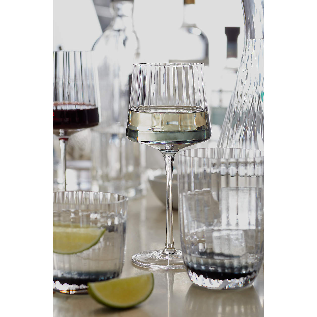 Ezra 7-Oz. Optic White Wine Glass + Reviews | Crate & Barrel | Crate & Barrel
