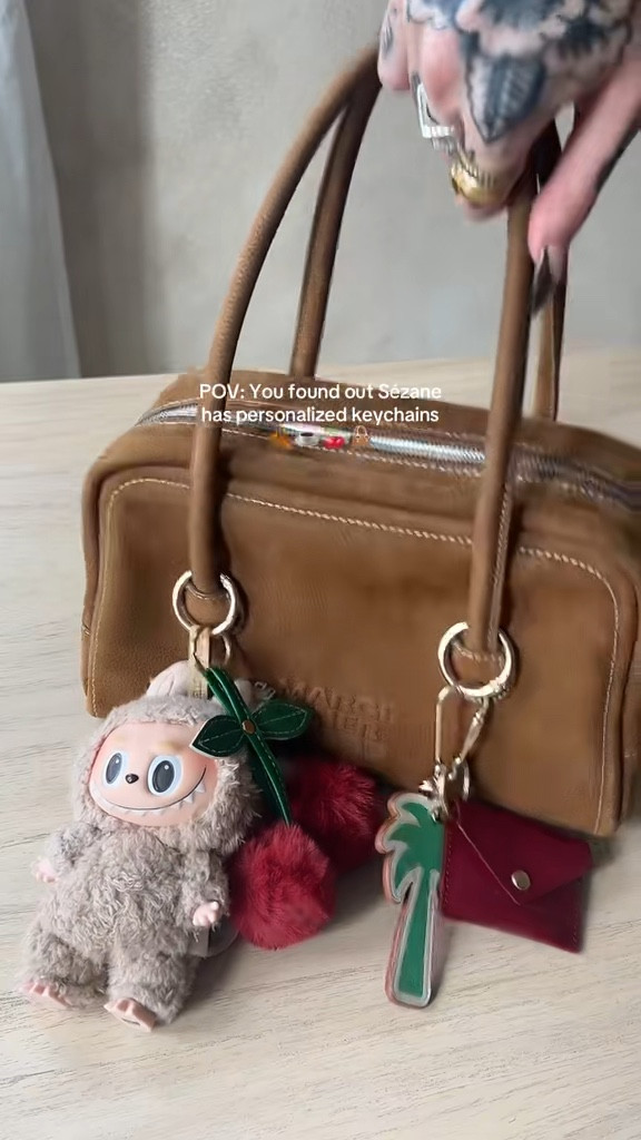 Best suede bag with bag charms 