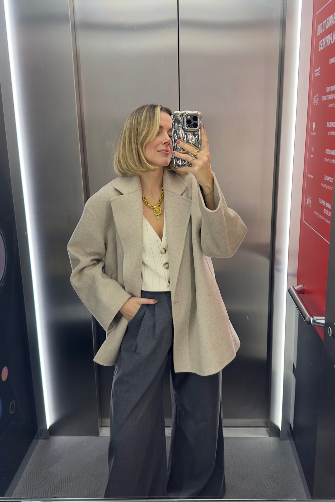 Wool blazer 
Linen waistcoat 
Wide leg grey trousers 

#LTKstyletip #LTKeurope #LTKSeasonal