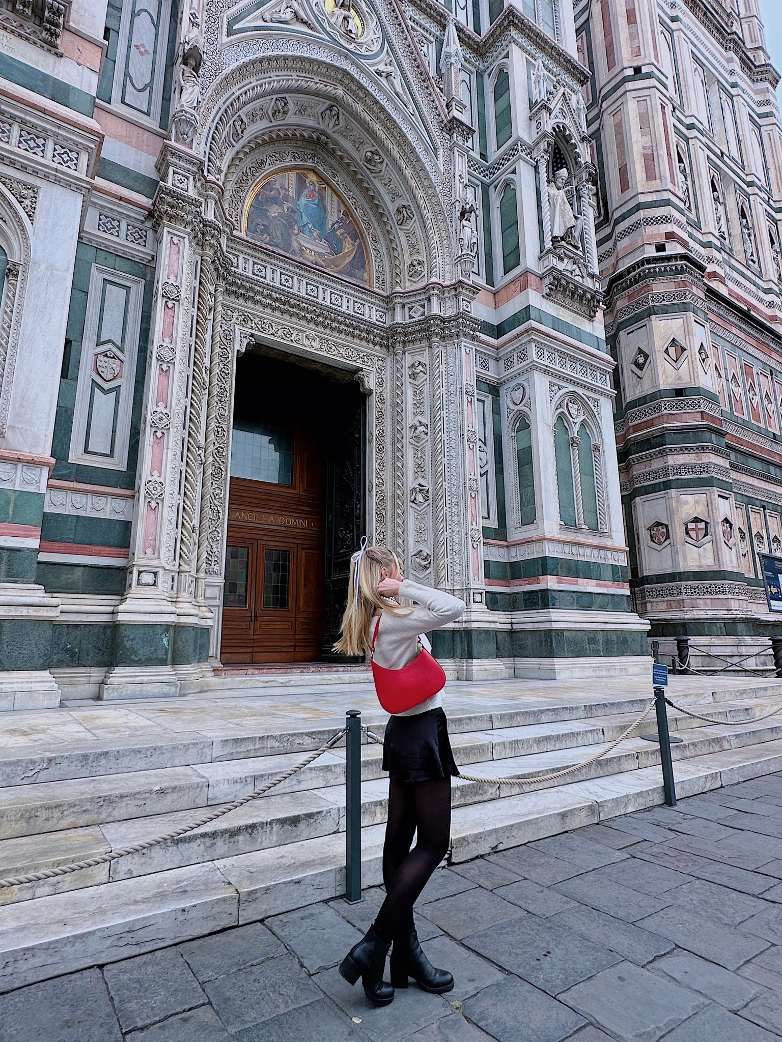 Italy outfit. Mini skirt outfit. Red outfit. Winter outfit. Italy travel. Outfit ideas. Black boots. Fall outfit. Ribbon. 

#LTKstyletip #LTKtravel #LTKSeasonal