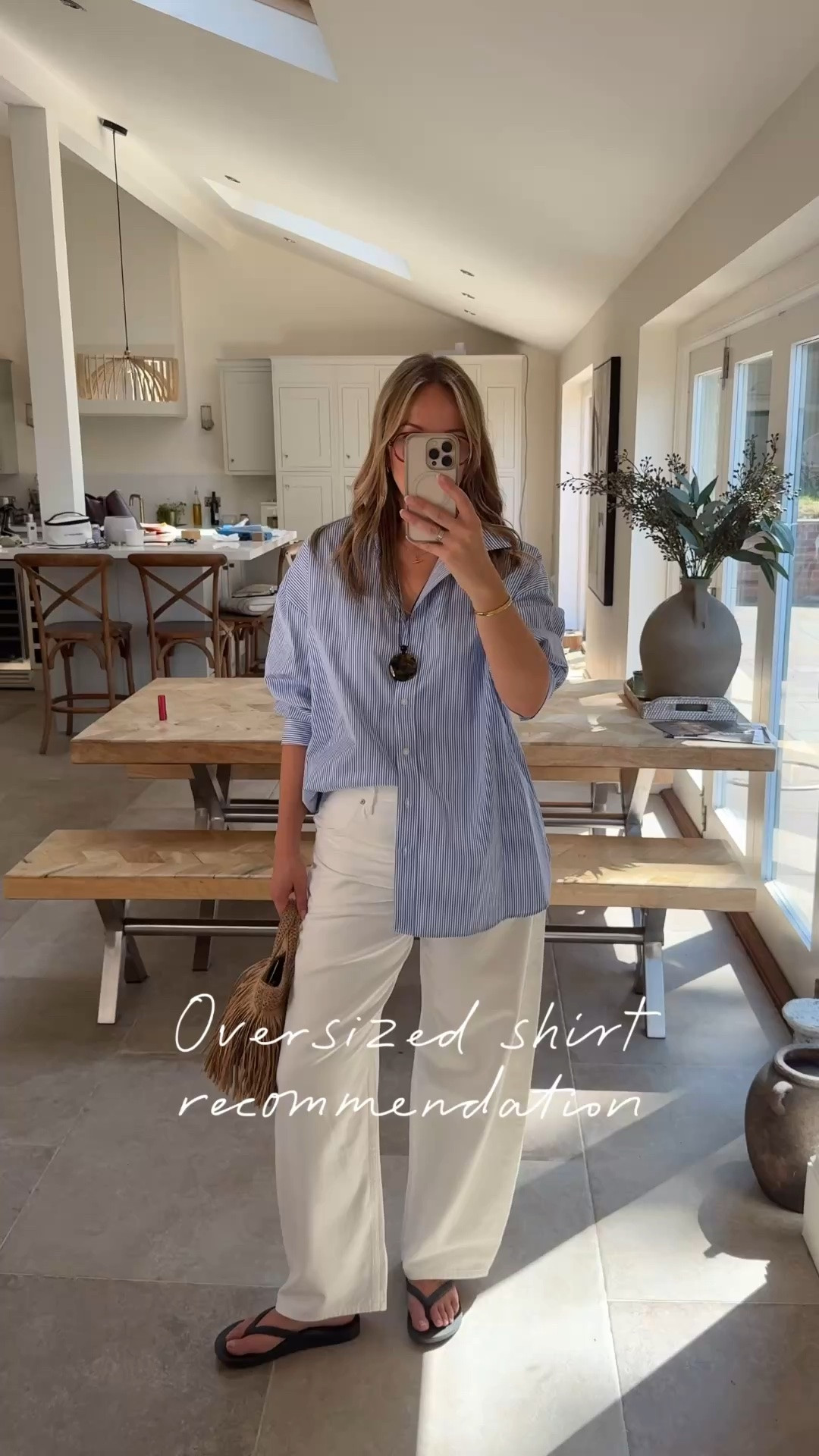 This is a beautiful shirt , premium quality cotton with a smooth finish , oversized longer line silhouette and unbeatable value at £20. It’s a great one for the office or to add a cleaner edge to your casual style. 
I’d take your regular size if you’re looking for a similar fit. 
Styled with these well loved white curve jeans and a raffia tote for an off duty lunch. 

Sizes 
Shirt U.K. 14 
Jeans 31 waist. 30 leg 
Vest - medium

#LTKtravel #LTKsummer #LTKstyletip