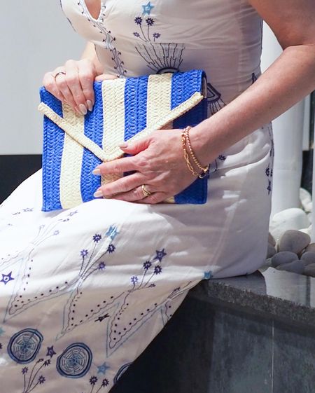 Boden blue striped clutch bag, reduced in the sale  

#LTKunder50 #LTKHoliday #LTKSeasonal