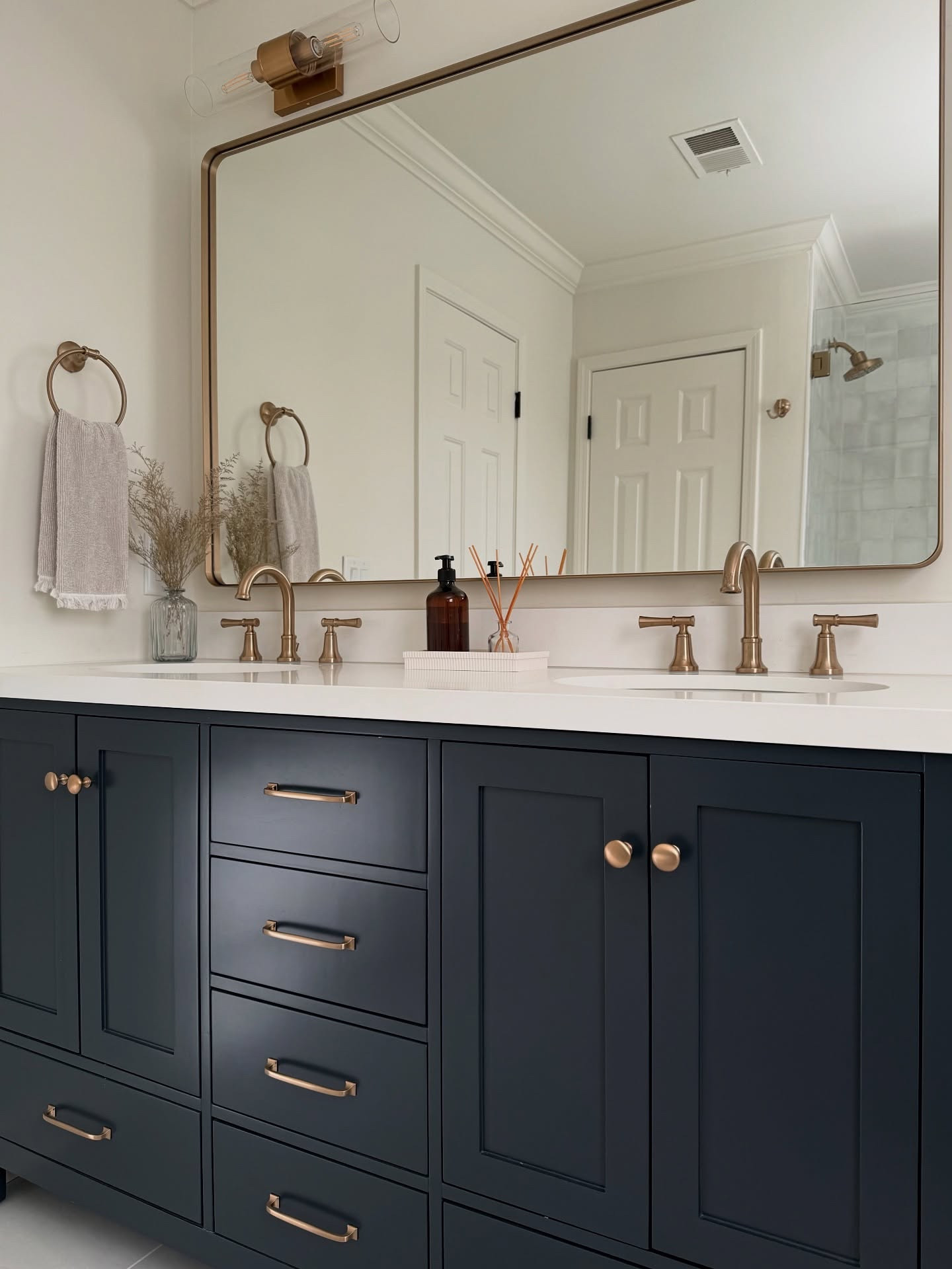 Nobody tells you how expensive a bathroom renovation can get but as someone who loves a luxury look on a realistic budget, l’ve found a few tricks that really make a difference.

In our guest bathroom we chose to go with a pre-fab vanity and then swapped in affordable hardware, some new lighting, and a few easy styling pieces. These simple upgrades made the transformation feel custom without the cost.

Save this post for your next bathroom upgrade!

Shop all of my favorite affordable bathroom finds here or at the link in my bio

Budget Bathroom Upgrades | Luxe for Less | Affordable Bathroom Decor | Guest Bathroom Styling | Bathroom Hardware Swap

#BathroomUpgrade #NeutralBathroom
#SmallSpaceStyling #BudgetHomeDecor #InteriorDetails #AffordableDesign #GuestBathroomInspo

#LTKFindsUnder100 #LTKStyleTip #LTKHome