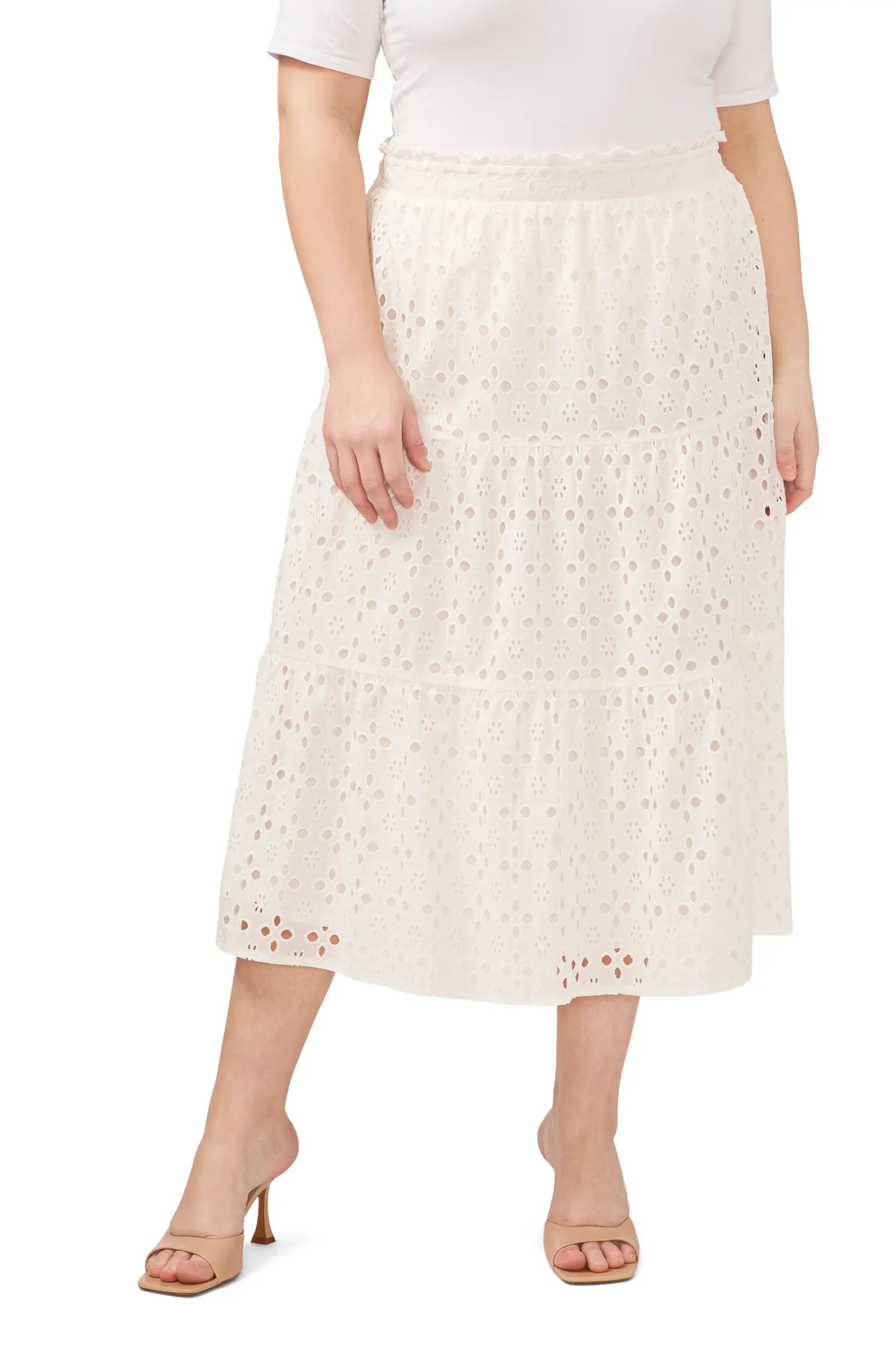 Floral eyelet embroidery adorns this airy cotton midi skirt that adds sunny-weather charm to any ... | Nordstrom
