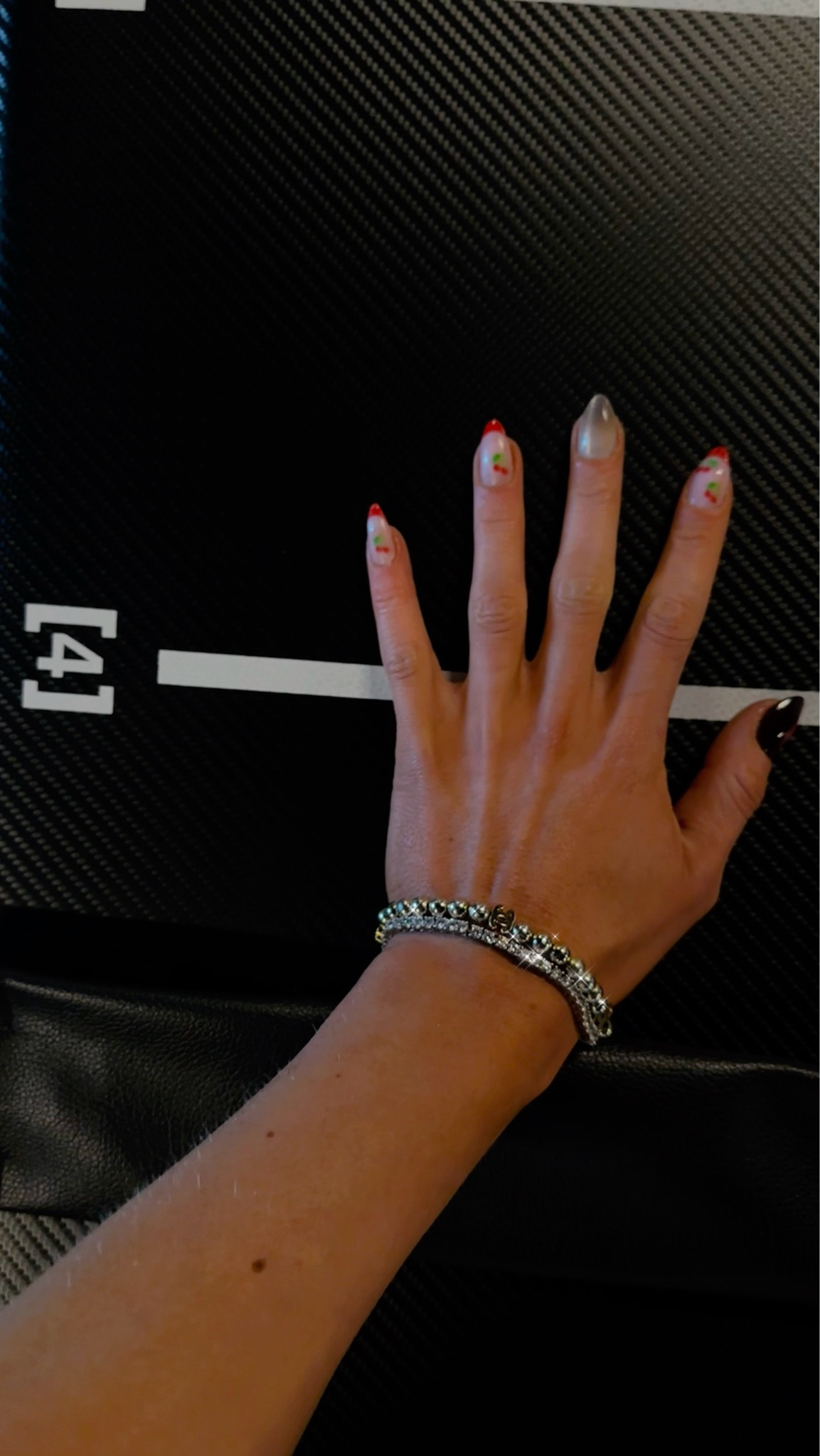 Nail Check 🖤🍒 

I love the summer fruit prints with a subtle colored French tip 

#summernails #nailinspo #Pinterestnails #tennisbracelet #pilatesnails  

#LTKBeauty #LTKSummerSales #LTKU