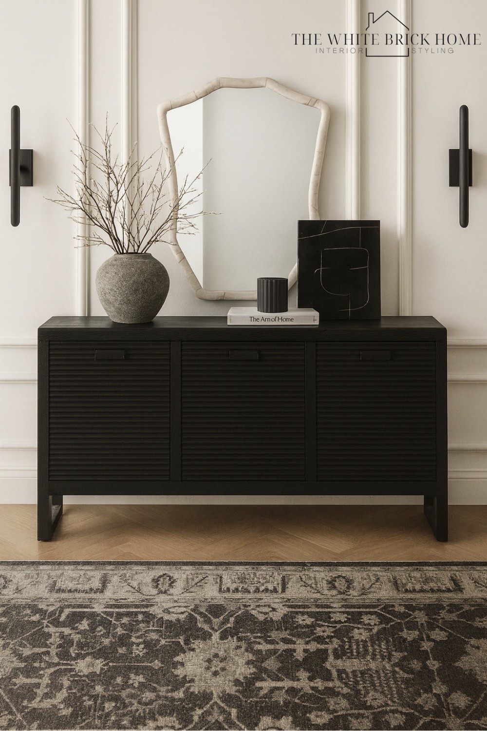 A striking blend of modern minimalism and classic texture, this sideboard moment adds an instant sophistication to an entry way or dining room! 

Sideboard, wall mirror, wall sconces, home decor, home design, dining room, dining room sideboard, dining room cabinet, dining room design, dining room ideas, modern dining room, storage cabinet, home decor idea, faux greenery, vase, wall art, sconces, wall sconce, area rug, modern rug, living area, living room, entry way, entry way console table, entry way storage, home decor, pottery barn, crate and barrel, Etsy, cb2 

#LTKGiftGuide #LTKHome #LTKFindsUnder100