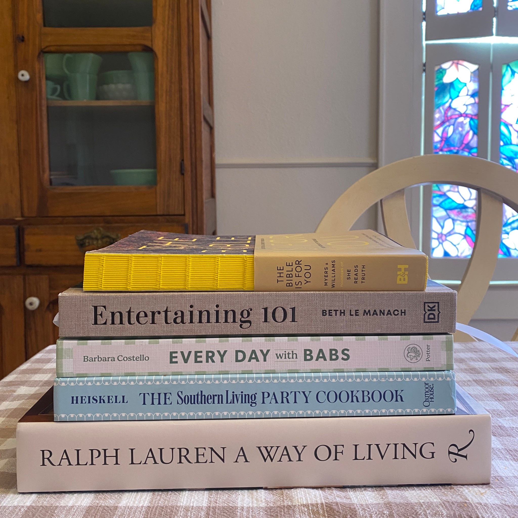 Five books I’m loving lately:
1. The Bible is for You, a devotional to help you read the Bible completely through. It’s filled with an easy to read devotional, followed by the verses that go with that day.

2. Entertaining 101, I checked it out from the library and loved it so much that I bought a copy. It’s full of entertaining advice, fabulous recipes, menus and advice for pulling the menus together.

3. Every day with Babs, let’s be honest - the hardest part of dinner is coming up with what to cook. This solves the problem!

4. The Southern Living Party Cookbook, my favorite on the list. Parties and occasions organized and menus planned for each. 

5. Ralph Lauren: A Way of Living, it’s pricey but worth it. Pages full of inspiration.

Many of these are currently half off. 

#LTKHome #LTKfoodie #LTKSaleAlert