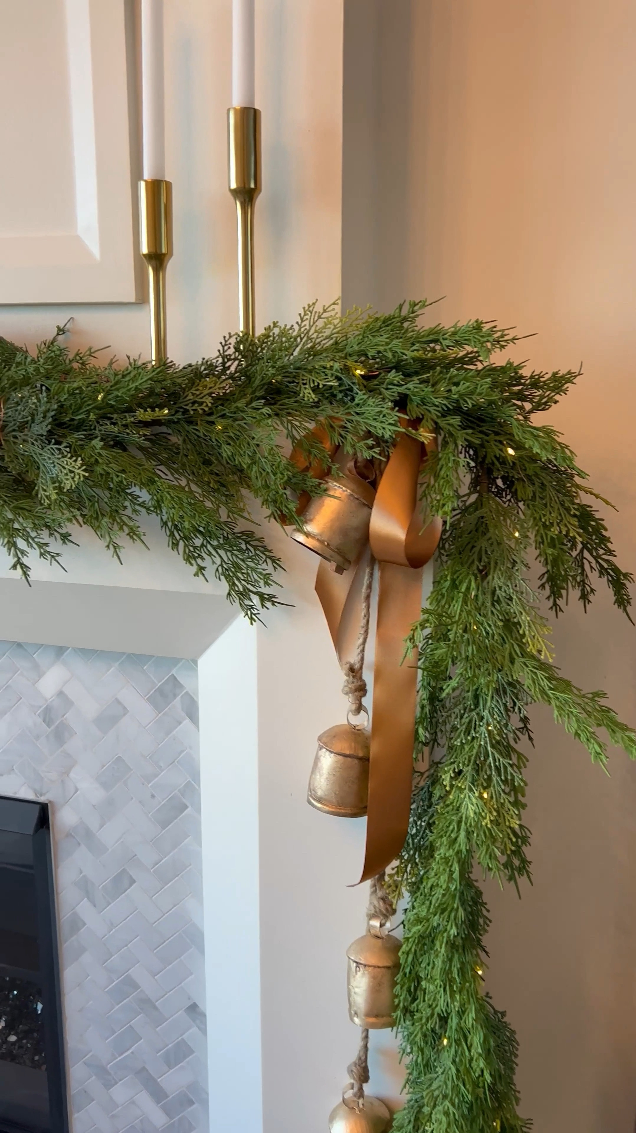 If it’s not the tree, then it’s definitely the mantle for the second place star of the show every year for the holidays. Keep your mantle in tiptop shape for the Christmas season with a simple garland your choice of ribbon and cowbells. This is the perfect DIY home decor for the holidays. If you hate spending hours on decorating, but still want something notable that says you’re in the spirit ! If you’re loving this look that I create it and took no time. Click the links below to shop the look 💕 Follow me For More and scroll to shop the look below!



#HolidayHome #ChristmasDecor #Garland #MantleDecor #FireplaceDecor #ChristmasFireplace #HolidayDecor #AmazonHome #MustHave #HomeFinds #HolidayDeals 


#LTKVideo #LTKHome #LTKStyleTip