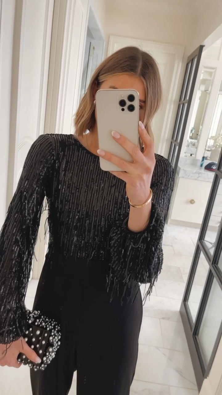 One and done! Holiday jumpsuit that's so flattering. I'm wearing size small/2