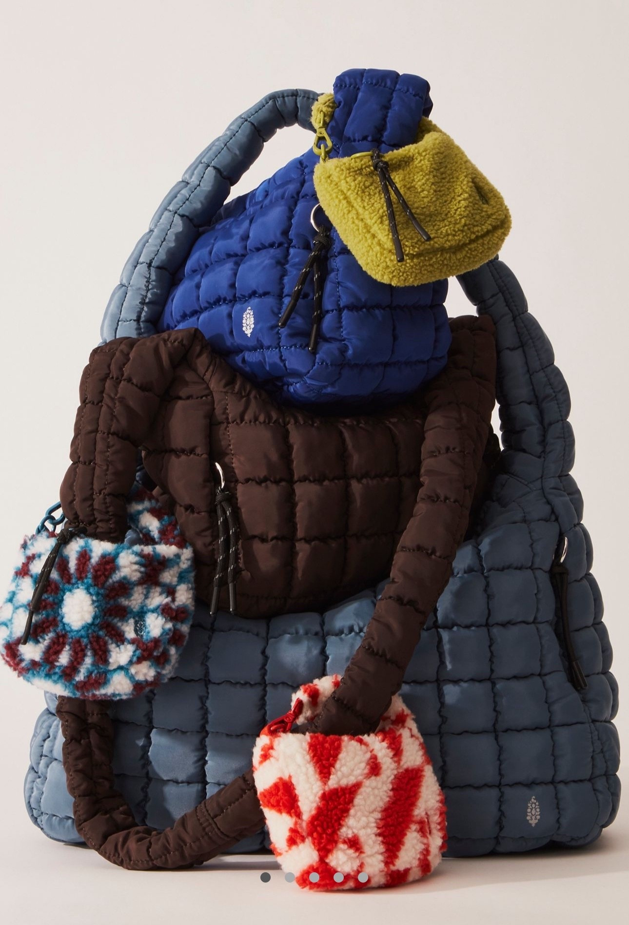 Free People Quilted Carryall

The fan-favorite tote featured in a sling design for versatility, with signature puffy quilting, bungee cord keyring zippers, and plenty of storage for all your essentials.

#LTKActive #LTKTravel #LTKootd