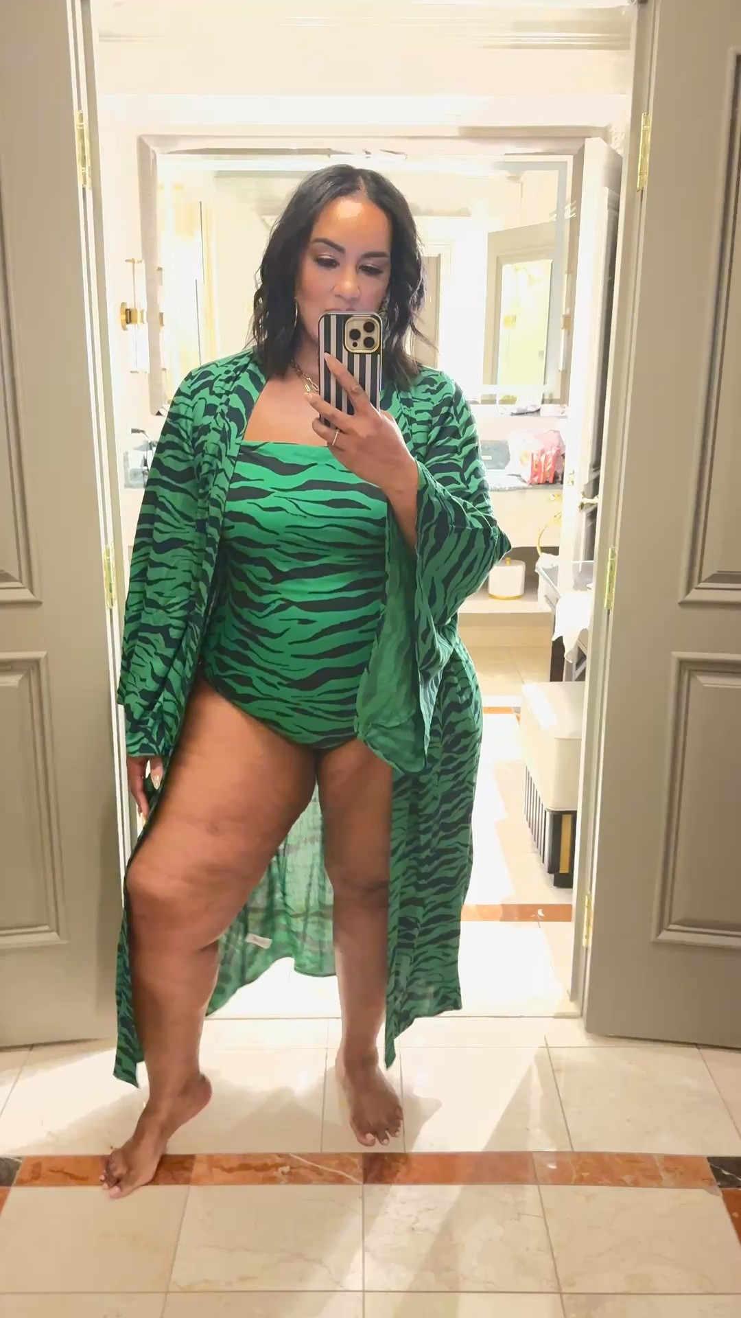 Obsessed with this swimsuit! Fashion meets function. Im wearing a 18 in the suit and 14:16 in the kimono

#LTKMidsize #LTKSwim #LTKPlusSize