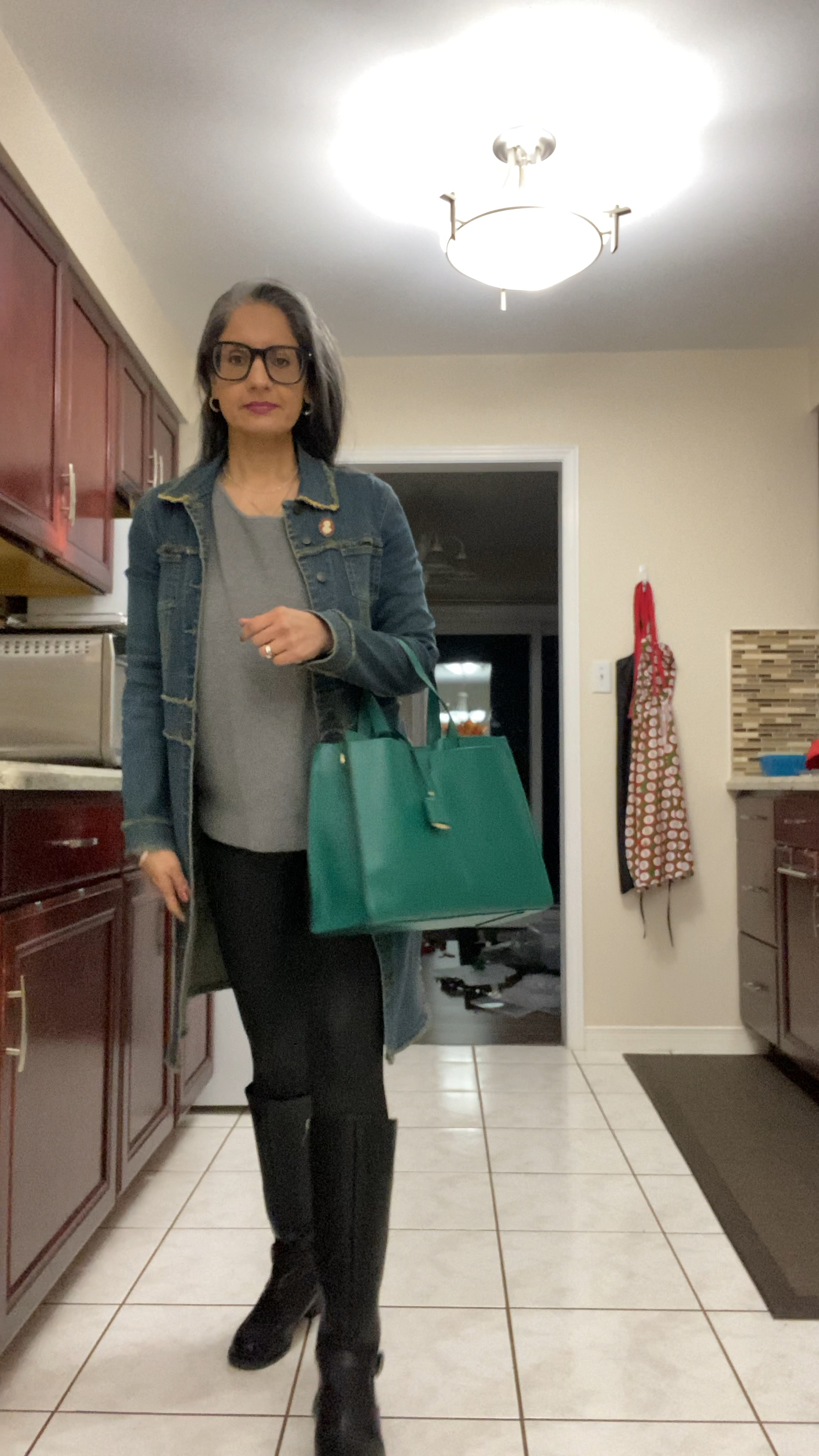 Menopause convention outfit:

Jean jacket: 15 years old
Gray sweater: Cyrus (Winners)
Faux leather leggings: Ardene (M)
Boots: Taxi (DSW)
Purse: Danier leather
Necklace: Pandora
Earrings: People’s Jewlers