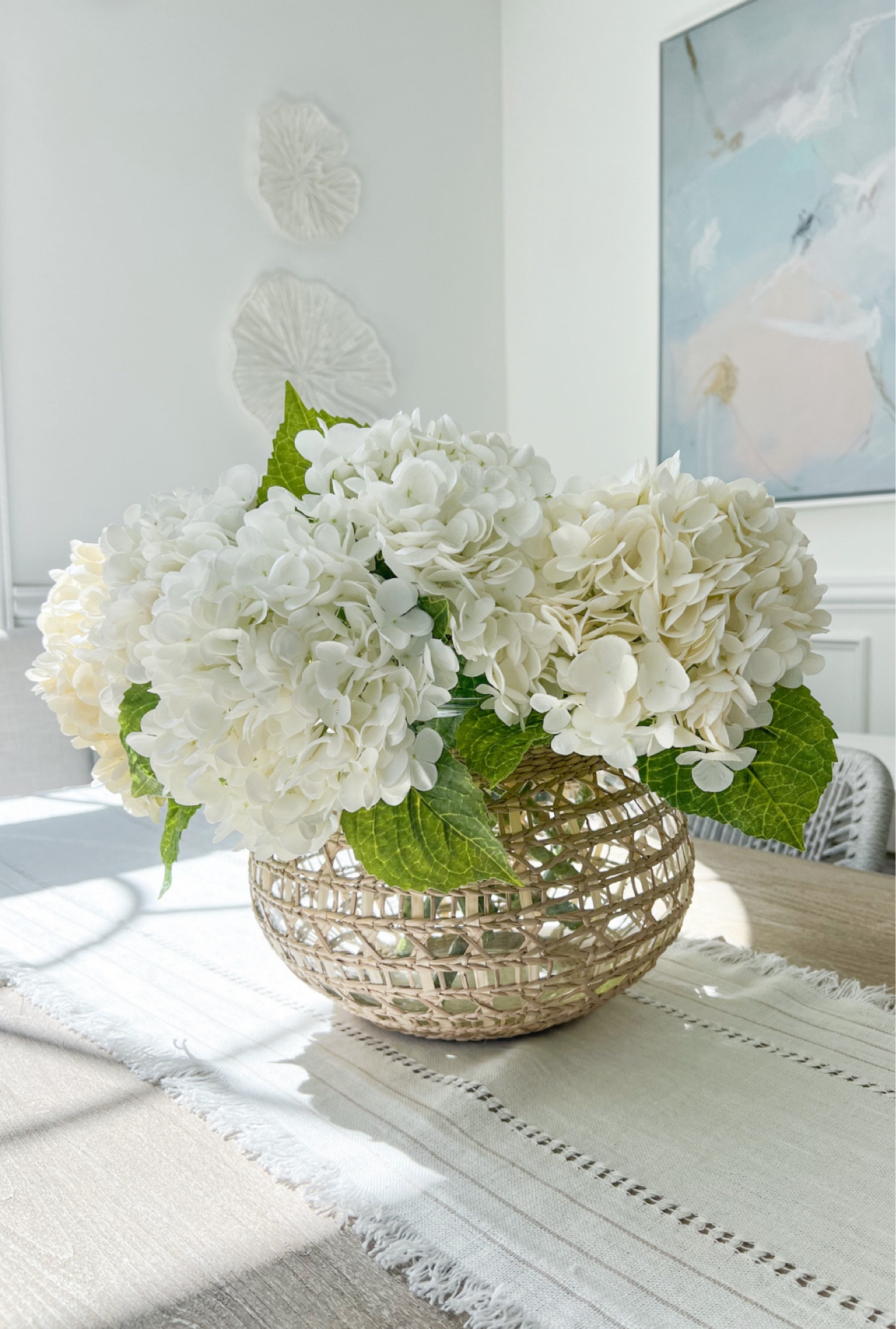 My vase (size large) is such a great size for a dining table centerpiece and it's currently 20% off! 

- 
coastal home decor, summer home decor, faux flowers, faux hydrangeas, amazon flowers, amazon hydrangeas, amazon summer decor, woven vases, oversized vases, serena & lily vase, cayman vase, coastal vases, large vases, round vases, dining room decor, dining table decor, coastal artwork, abstract artwork, coastal wall decor, dining table centerpiece, oversized art, blue artwork, valentine's day decor, amazon finds, amazon home finds, amazon home decor, serena & lily decor, amazon decor, spring decor, large vases, coastal dining room, summer flowers

#LTKStyleTip #LTKHome #LTKSaleAlert