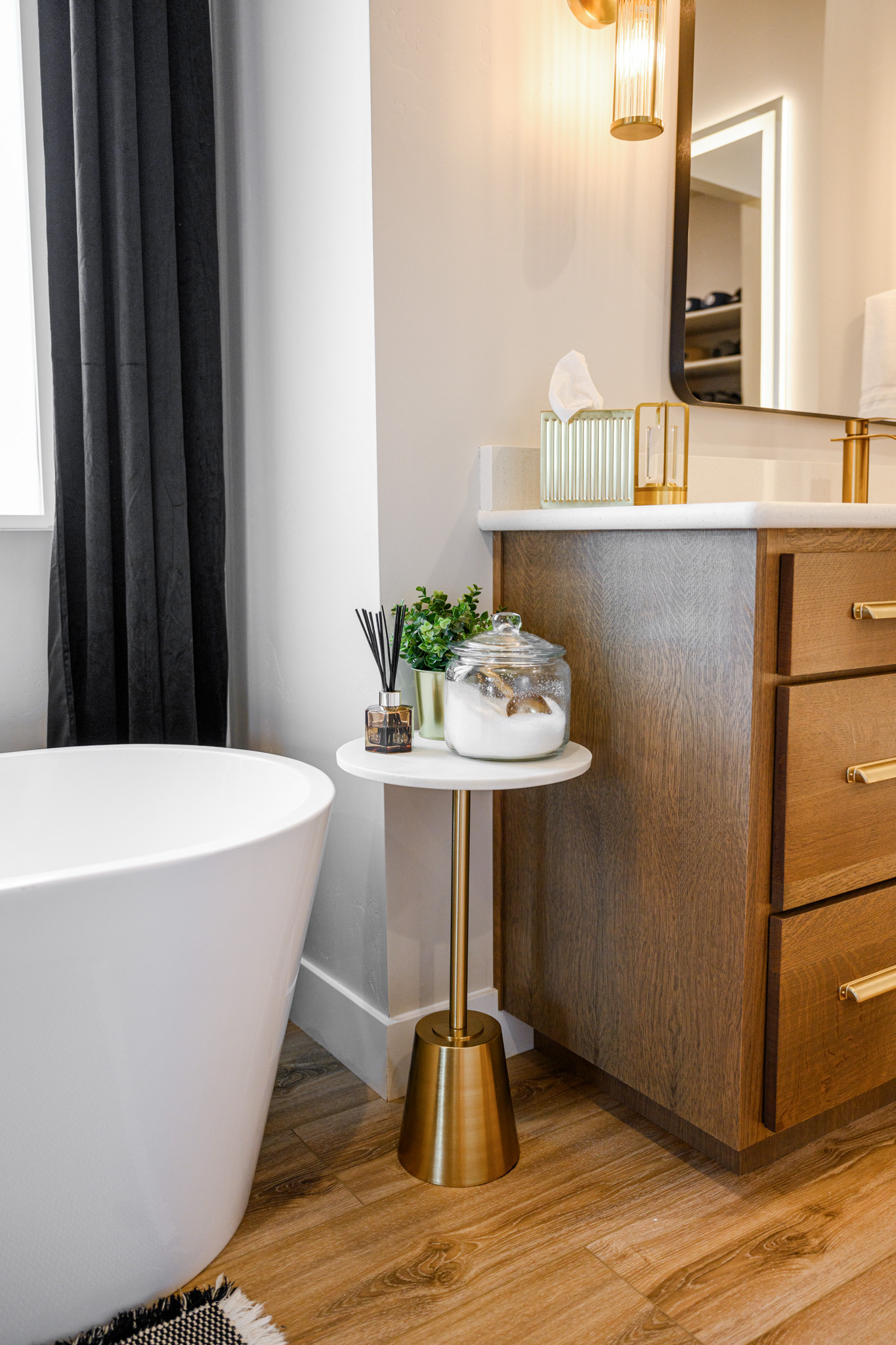 I love this little table that I have next to my master bathroom bathtub that allows me to store all of our bath salts in acute way that feels really high-end, but it's on a budget! The gold scoops are my favorite!

#LTKFindsUnder50 #LTKHome #LTKFindsUnder100