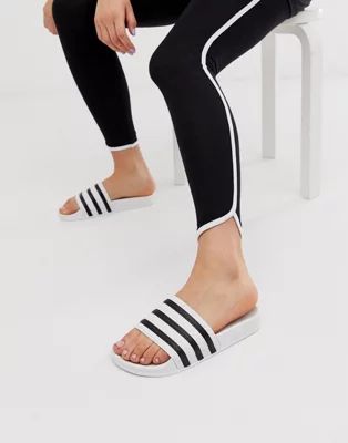 adidas Originals Adilette sliders in white and black | ASOS US