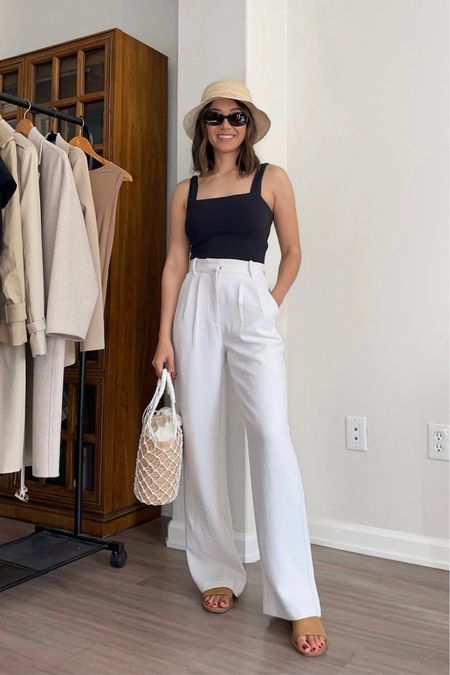 Vacation outfit styling white pants 

• top - xs, old, linked to similar style 
• pants - Abercrombie crepe pants, size 25 regular, linked to the other similar styles 
• straw hat - jcrew 
• sunglasses 
• sandals 
• straw bag 

- Abercrombie, vacation, travel

#LTKfindsunder100 #LTKstyletip #LTKtravel