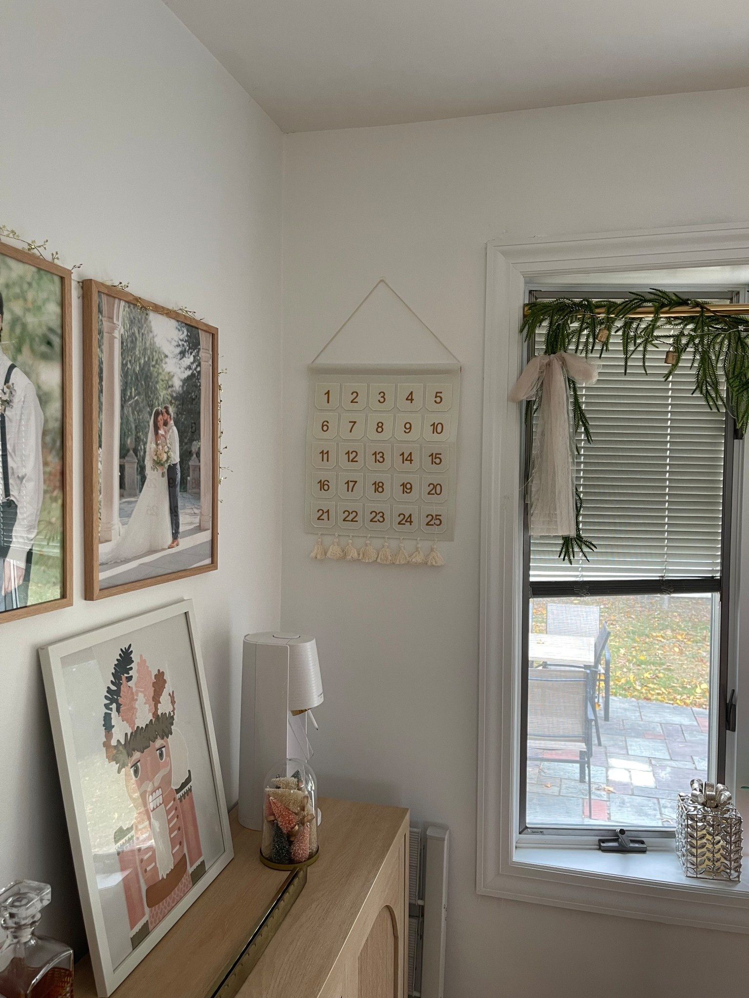 Christmas decorating is nearly finished over here! Here’s where we set up our Polaroid advent calendar, next to our shower rod garland over the windows

#ltkhome #ltkholiday