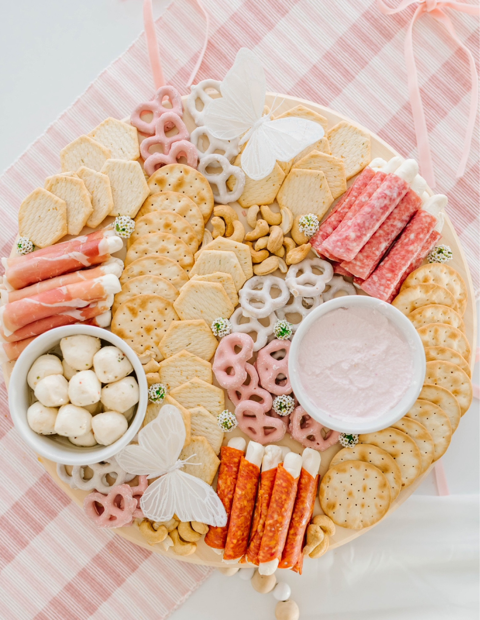 
🌸 Pink Charcuterie Board 🌸

💕 Obsessed with the new eating pink things these days and with Valentine’s approaching, here are my top tips to create pink charcuterie magic:

🍓 Pink Fruits: Include a variety of fresh and dried pink fruits like strawberries, raspberries, watermelon, and dragon fruit.

🧀 Cheeses: Opt for pink or blush-hued cheeses like cranberry cheddar, goat cheese with cranberries, or a creamy raspberry-infused cheese.

🌟 Cured Meats: Select light-colored cured meats that complement the pink theme, such as prosciutto, turkey, or even rosemary-infused ham.

🌷 Spreads and Dips: Introduce pink-themed spreads like beetroot hummus, raspberry compote, or strawberry jam to add flavor and color.

🌺 Extras: Add whimsical elements such as pink macarons, edible flowers, or even pink chocolate for a touch of sweetness.

👋🏼 Would you try this pink charcuterie for your party? 🌸

#LTKparties #LTKhome #LTKfindsunder50