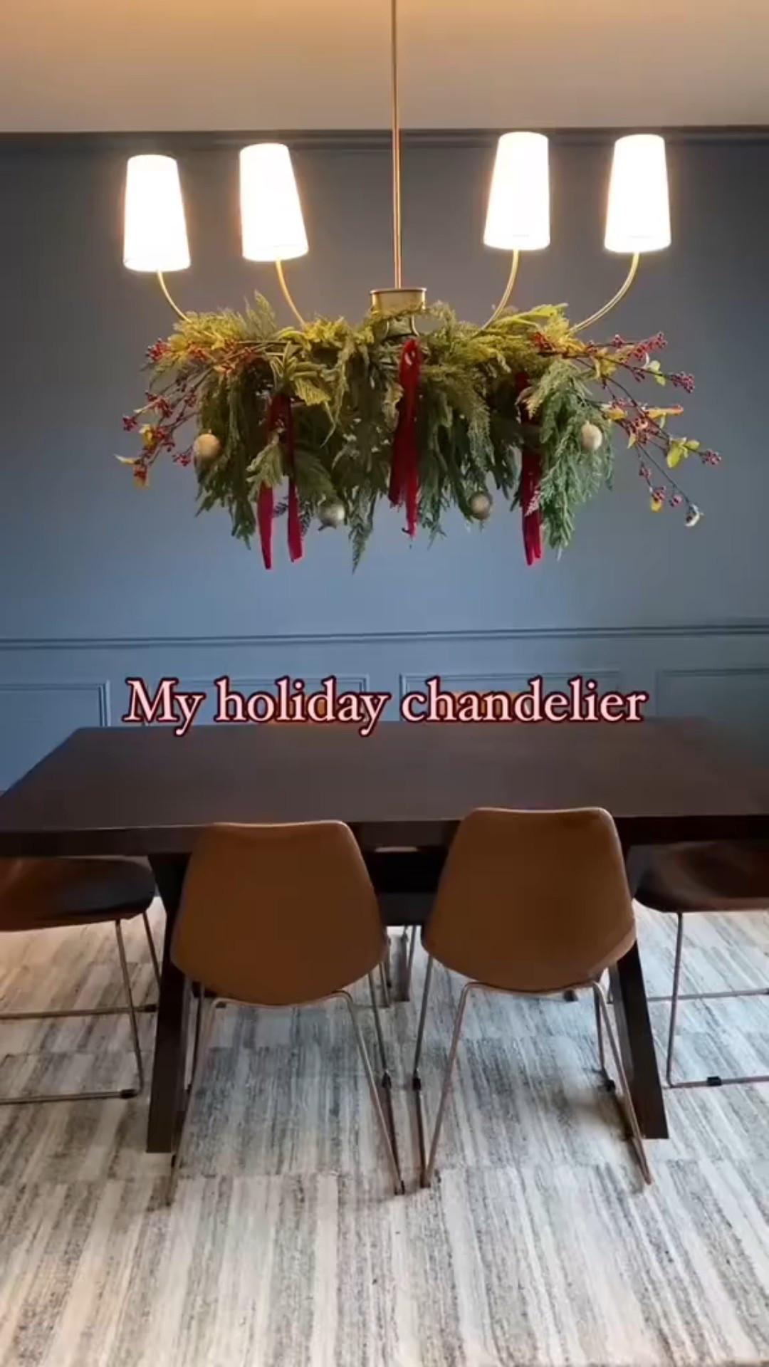 Use your favorite christmas garlands to create a dramatic christmas chandelier decor. Then add your favorite ribbons and bulbs #christmasgarland #diningroomchristmas #chandelierdecor #christmasdining  
#

#LTKHome #LTKHoliday #LTKSeasonal