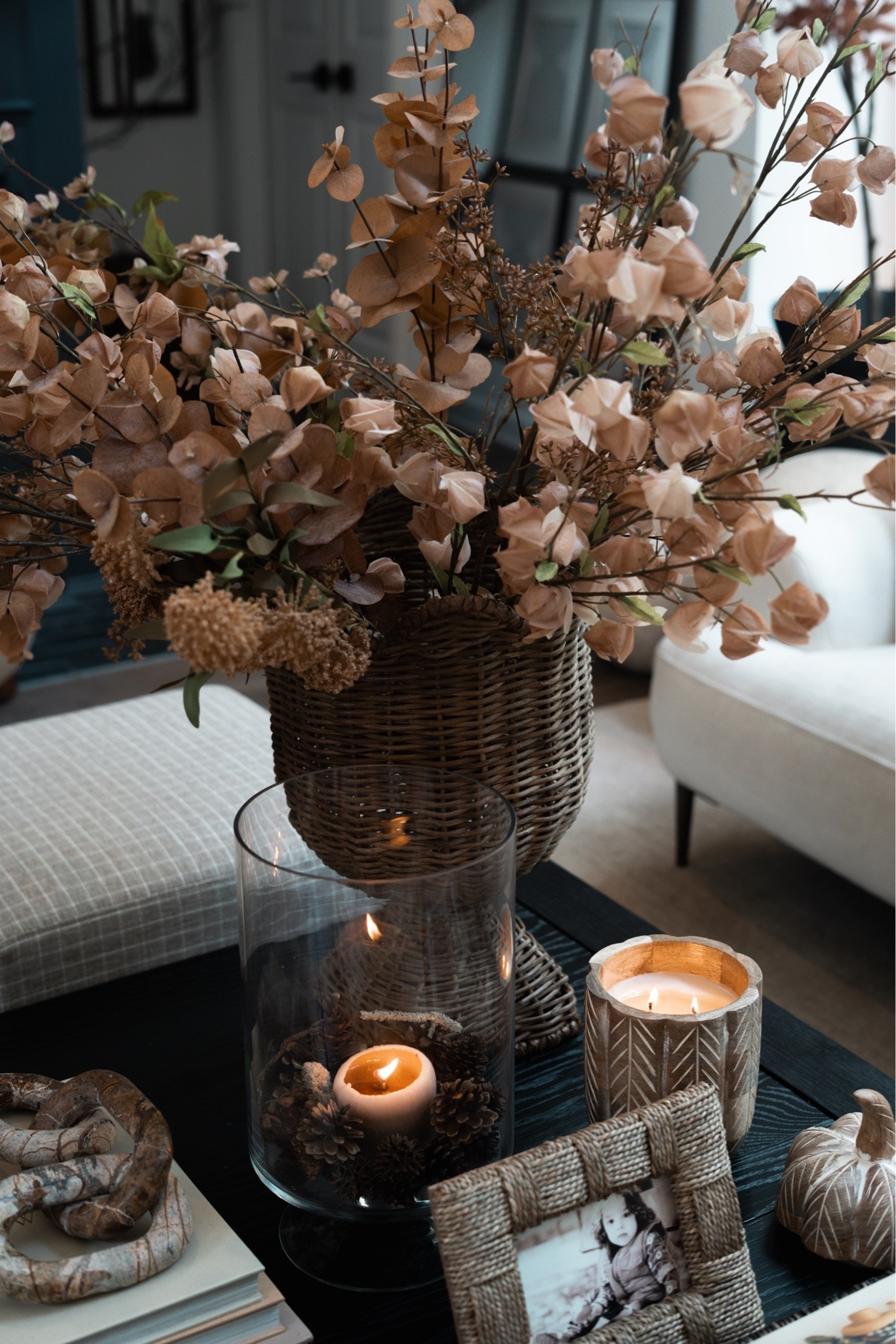 The centerpiece of this coffee table is this gorgeous rattan vase filled with these warm faux fall stems!

#LTKHome #LTKSeasonal #LTKdayinmylife