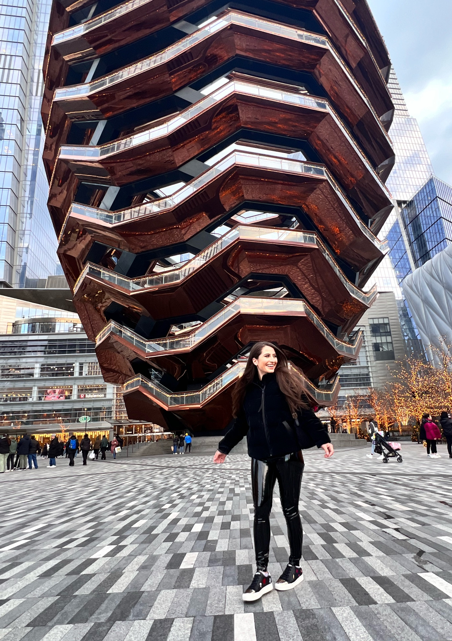 All black travel outfit to tour in. I wore these patent leather leggings, and a puffer jacket that was weather appropriate and some cool sneakers to add a cool detail to the otherwise basic look. 

#LTKtravel #LTKstyletip #LTKshoecrush