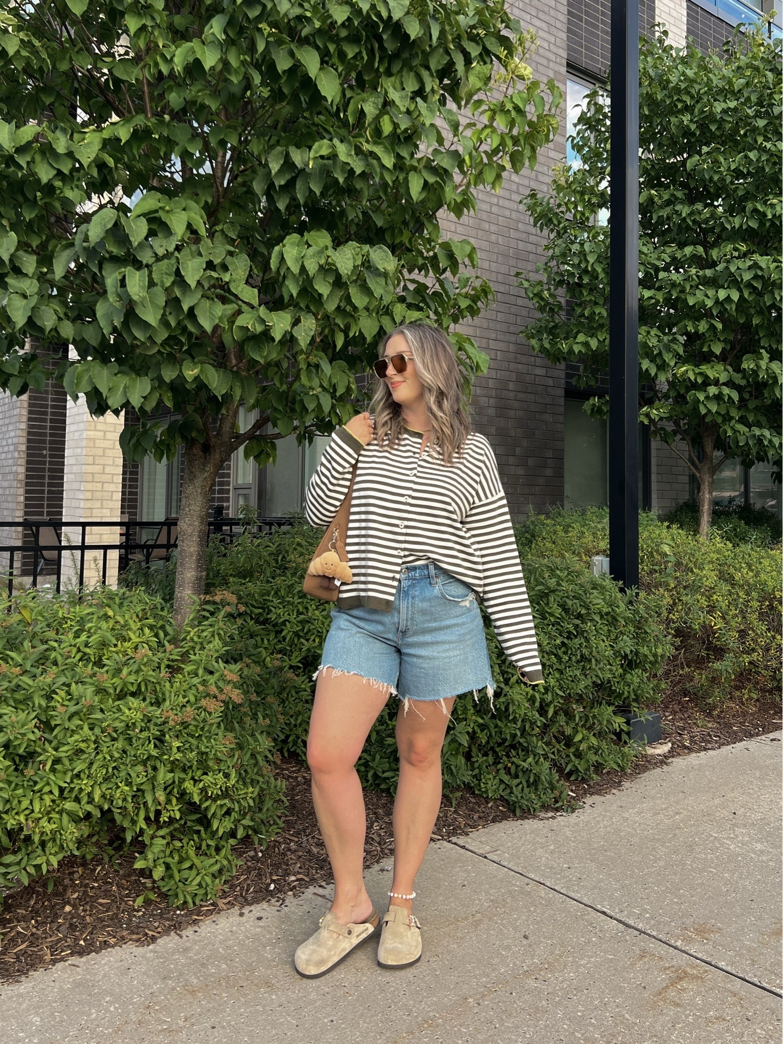 Early fall outfit! Wearing M in the striped cardigan. Sized up to 32 in the denim shorts for a baggy fit. I’m a 9.5-10 shoe and wear a 10 in the Birkenstock clogs

#LTKfall #LTKmidsize #LTKstyletip