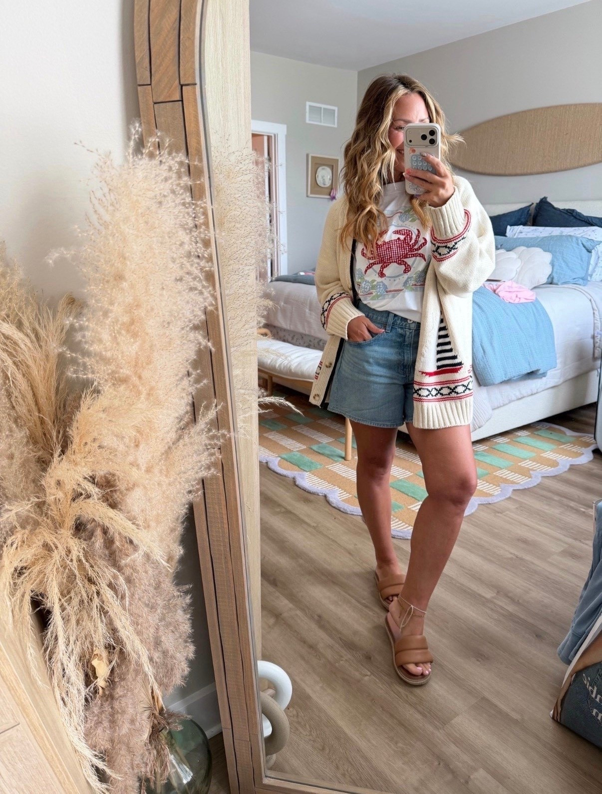 Coastal casual but make it cute 🦀☀️

This outfit is giving effortless summer—light layers, comfy denim, and the kind of graphic tee that makes the whole look feel fun without trying too hard.

Perfect for beach days, running errands, or grabbing a casual dinner 🫶

✨ graphic tee
✨ cozy cardigan
✨ denim shorts (size up for relaxed fit)
✨ neutral sandals
✨ easy everyday outfit
✨ coastal summer style
✨ casual mom uniform