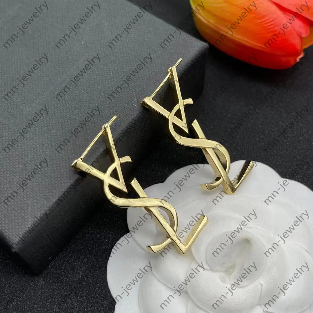 Gold metal brass letter logo stud earrings. Europe and the United States simple fashion designer ... | DHGate