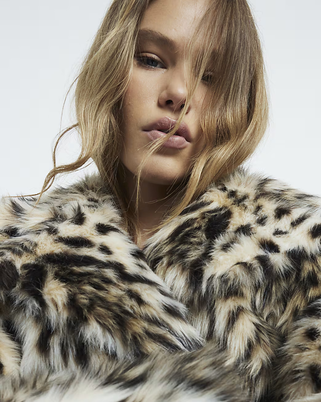 Brown faux fur leopard print coat | River Island (UK & IE)