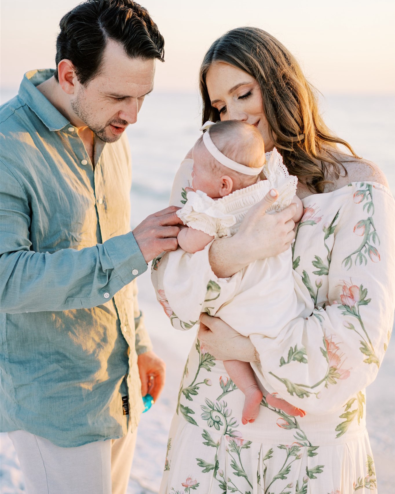 Loving this green, cream, and blush color palette for a beach family photoshoot. My client rented this gorgeous floral dress from rent the runway and styled the rest of her family around the colors in the dress. 

Beach family photo outfits - family pictures- spring family photo outfits 
