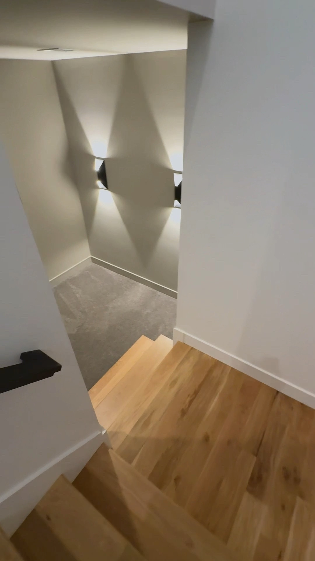 With so many blank walls in new builds, we wanted to do something intentional so it wasn’t just another place to hang another photo so we installed these two sconces that have up-and-down lights totally love the modern looking feel and ambience they create!

#LTKHome