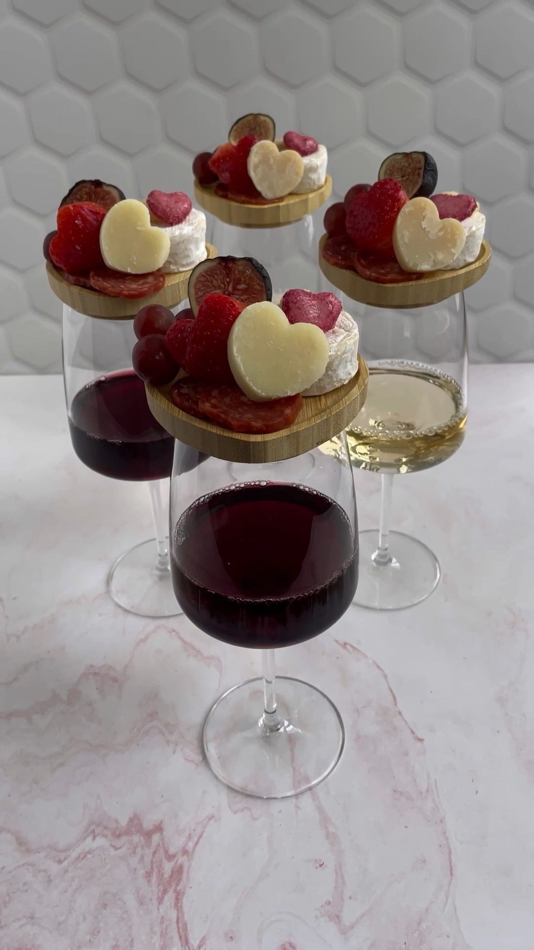 These heart shaped wine glass toppers are so fun and flirty. Perfect for galentines or just a girls night watching your favorite soapy rom com 