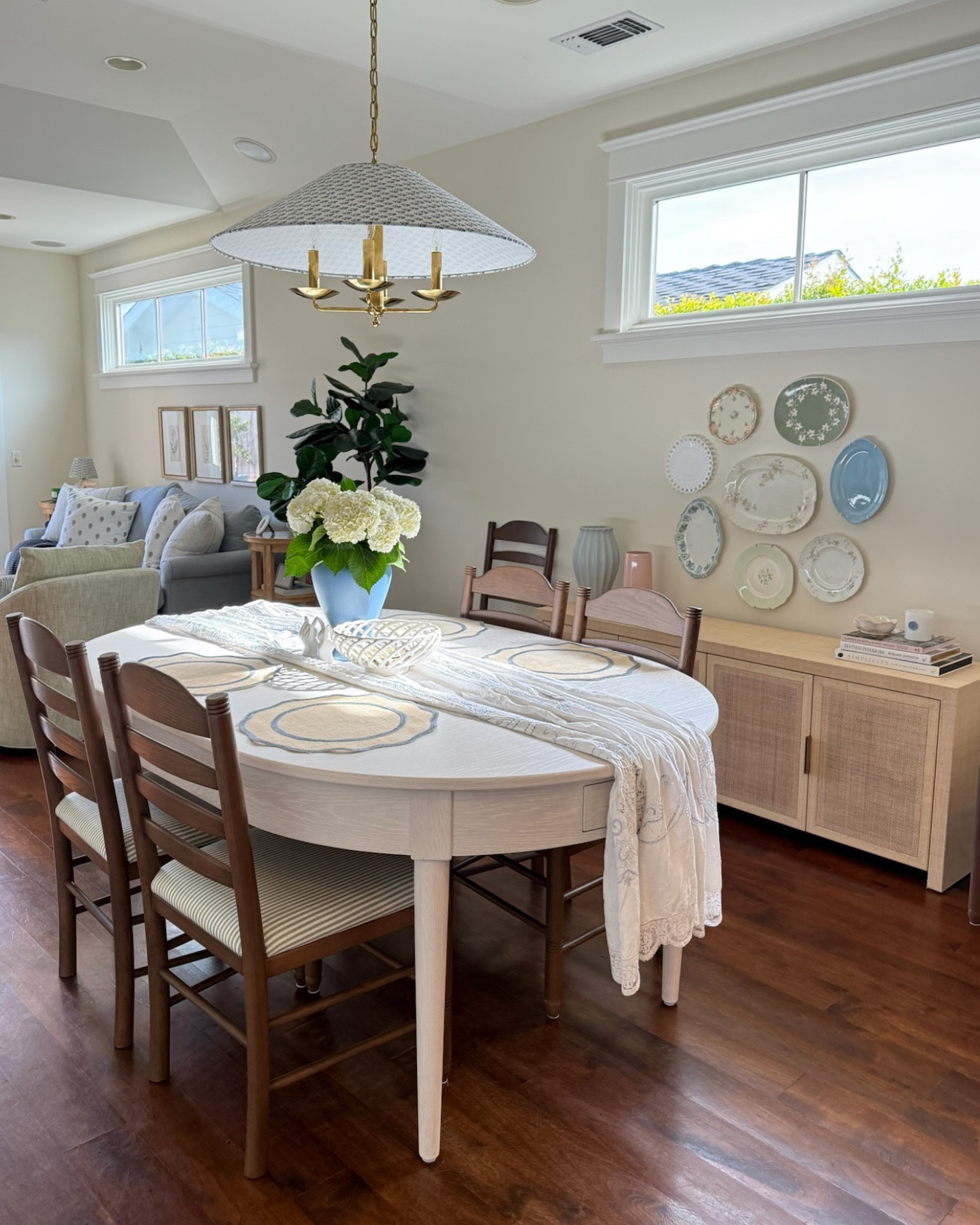 A green blue and white dining room of my dreams!
Check out the full home makeover process on my YouTube channel!

coastal cottage aesthetic, coastal cottage decor, dining room decor, dining room makeover, home makeover, coastal home, cottage style home, coastal interior design, coastal dining room, beach house decor, dining room inspiration, dining table decor, coastal dining table, woven dining chairs, cane dining chairs, rattan dining chairs, wood dining table, buffet cabinet, rattan buffet, coastal sideboard, dining room sideboard, blue and white decor, blue and white table setting, coastal table linens, scalloped tablecloth, hydrangea centerpiece, floral centerpiece, blue vase decor, decorative wall plates, plate wall decor, coastal wall decor, white kitchen cabinets, glass display cabinets, coastal chandelier, woven pendant light, statement dining light, neutral home decor, cottagecore decor, timeless home decor

#LTKvlog #LTKHome #LTKdayinmylife
