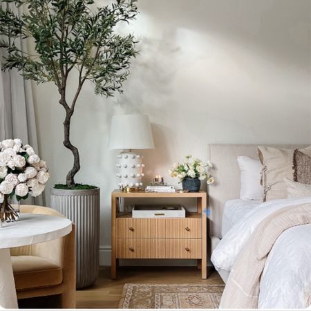 Bedroom nightstand, olive tree, lamp, florals, bed, table, chairs, style

#LTKFamily #LTKHome #LTKStyleTip