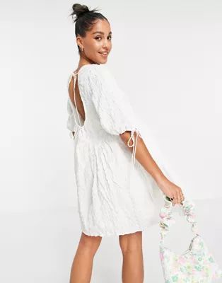 ASOS DESIGN textured cut out back detail mini smock dress with ties in white | ASOS (Global)