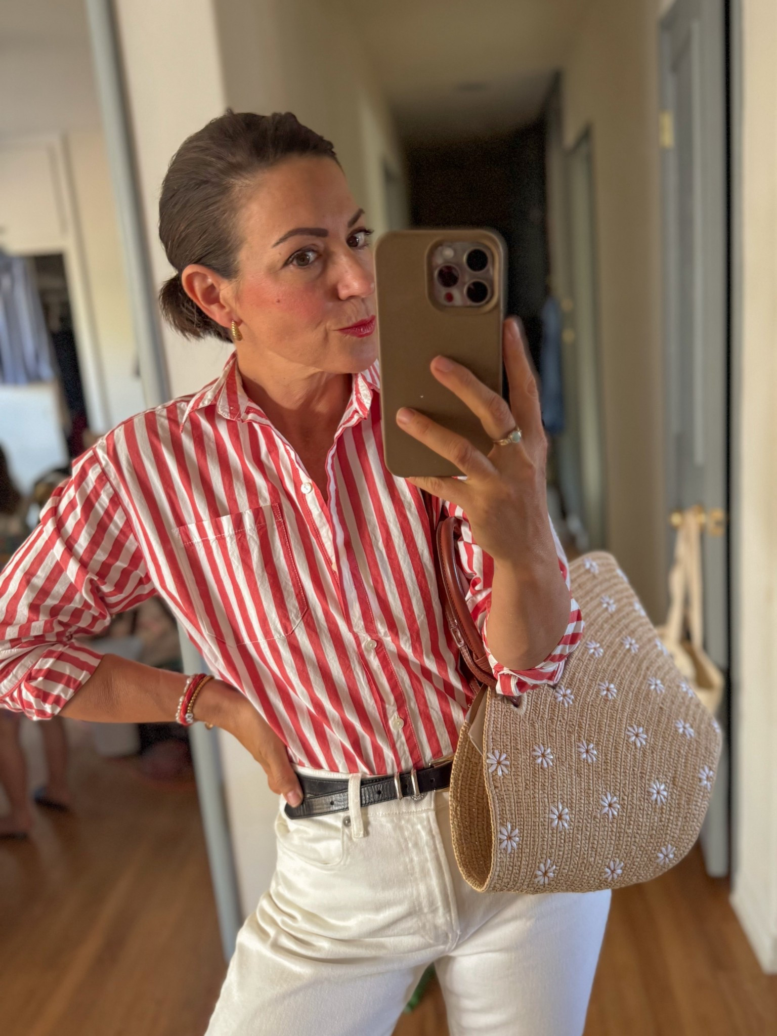 Striped red shirt: Max Shirt, wearing a 36
Black thin belt and Summer basket bag with embroidered flowers: everything is from Sézane
White high waisted jeans: Everlane




#LTKbag #LTKeurope #LTKsummer