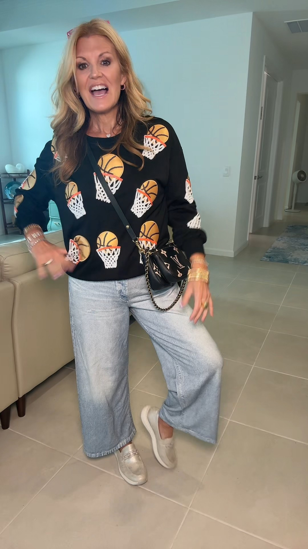 Such a fun #ootd @QVC, Inc 

I’m wearing this small in the jeans, you definitely want to size down in those. 

My top is a medium and fits true to size 

The shoes are true to size as well. 

￼#SweatpantsJeans
#QVCLoyaltyProgram 
#Basketball 
#LookForLess ￼

#LTKOver40 #LTKootd
