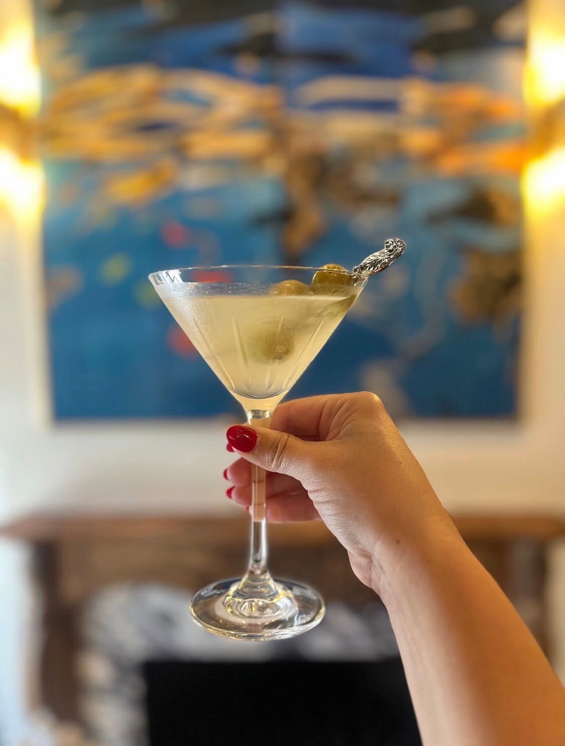 Dirty Martini 🍸
3oz vodka 
.5oz olive brine
.25oz water
Shake over ice for 2 minutes and serve with olives. 